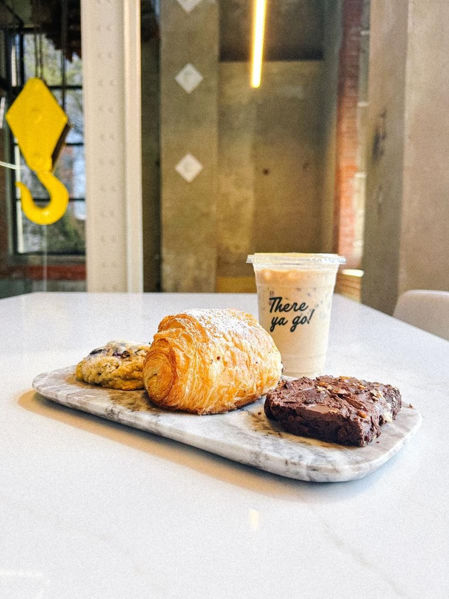 Croissant, scone and brownie with an iced latte